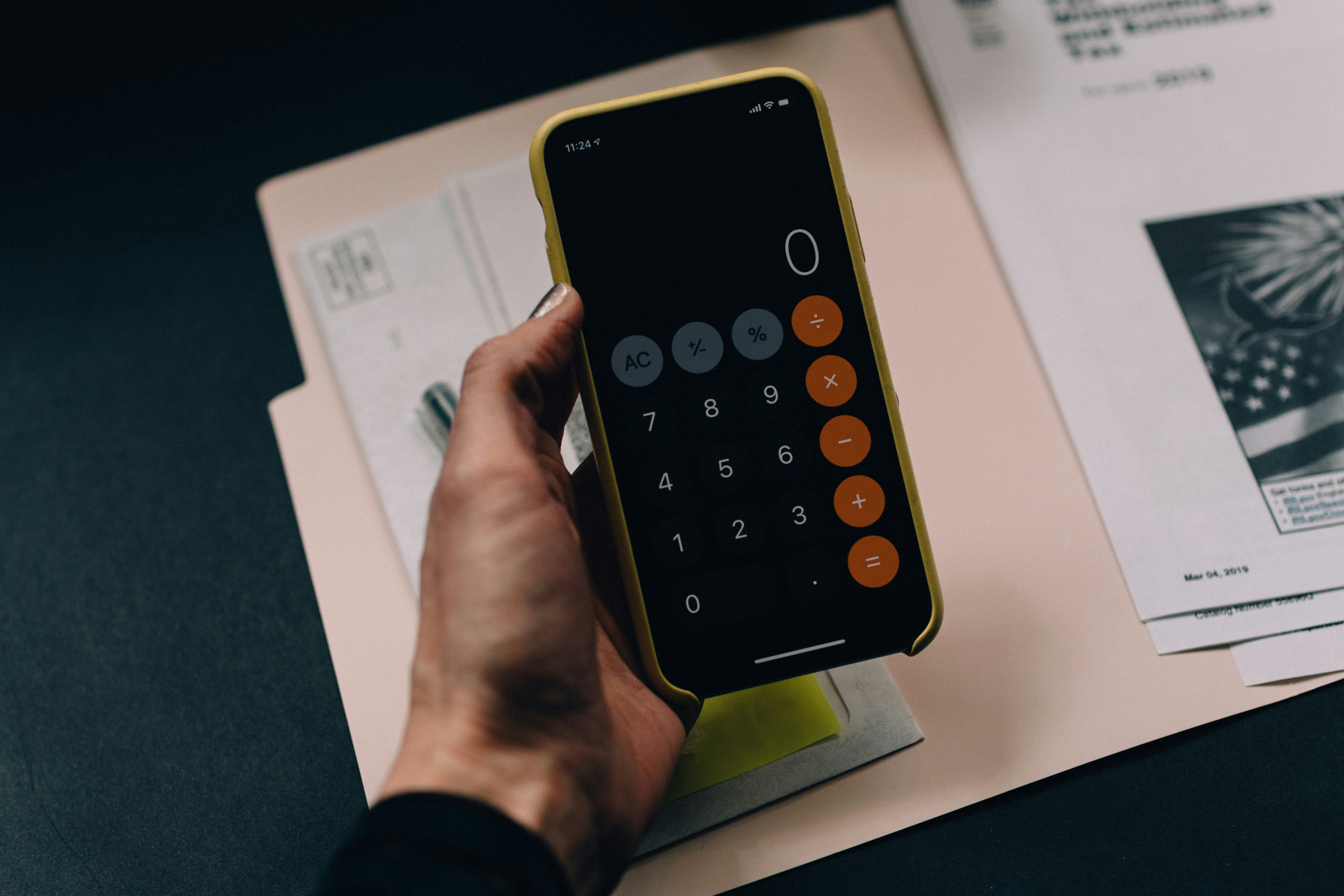 Person planning budget on tablet